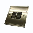 2 Gang 2 Way 10A Rocker Switch in Antique Brass and Black Trim Elite Stepped Flat Plate